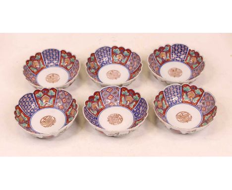 A set of six Japanese Meiji period bowls each of lobed circular form, enamel decorated in the Imari palette, dia. 14cm