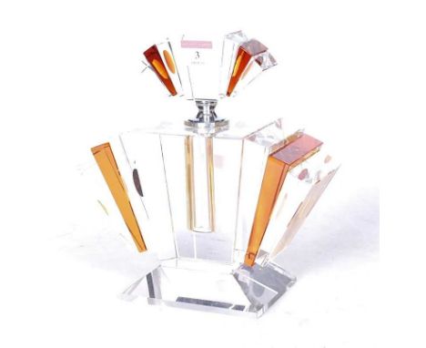 An Art Deco style clear and amber glass scent bottle, of fan shape, h.23cm