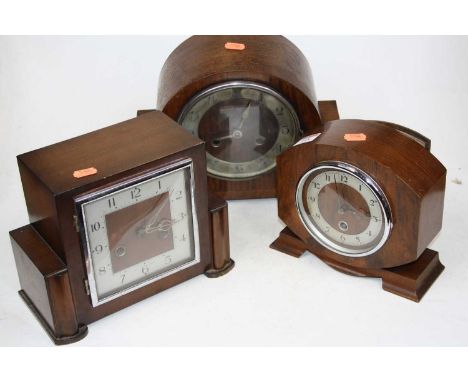 A 1930s walnut cased mantel clock having a silvered chapter ring and eight day movement, height 23cm, together with one other