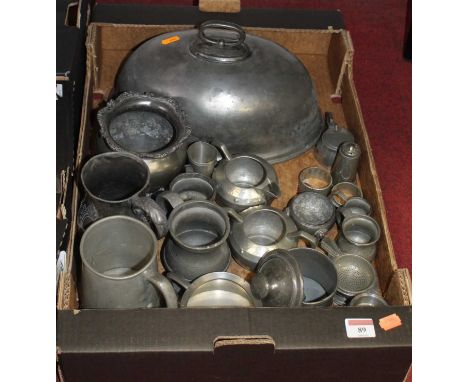 A box of miscellaneous 19th century and later pewterwares, to include tobacco jar and cover, meat cloche, bell shaped tankard