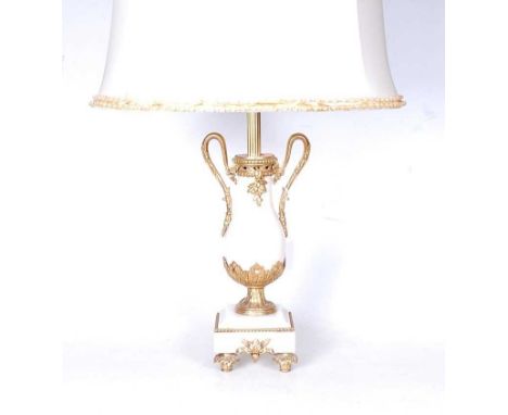 A 19th century style polished and brass mounted hardstone table lamp, the baluster form body flanked by twin loop handles, h.