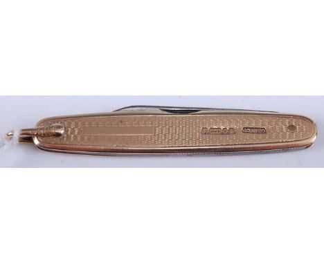 A steel and 9ct gold mounted pocket fruit knife with engine turned decoration, maker GB &amp; Co. 65mm gross weight 15.3g