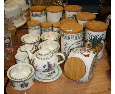 A collection of Portmeirion table wares in the Botanic Garden pattern to include storage jars and covers, teapot, cream jug e