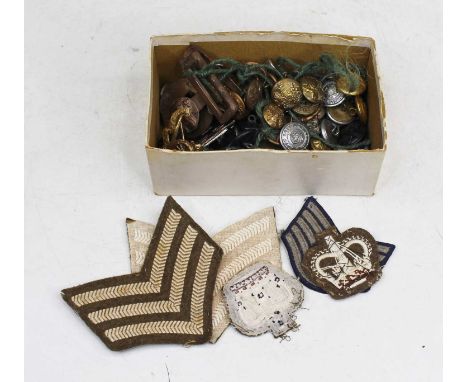 A small collection of miscellaneous military items to include Royal Artillery cap badge, Royal Army Pay Corps buttons, Rank C
