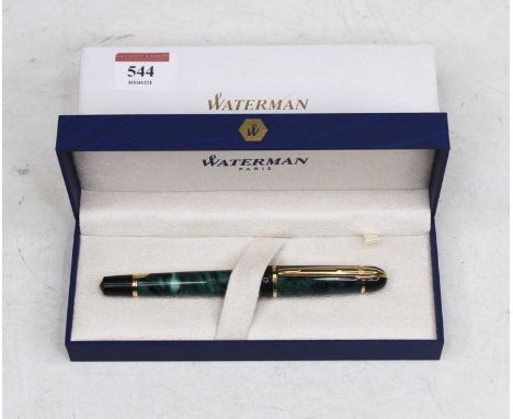 A Waterman's fountain pen, having a faux malachite cap and barrel, with gilt clip and banding, boxed and in card outer sleeve