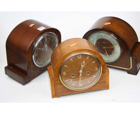 A 1930s walnut cased mantel clock having raised Arabic numerals and chiming movement, height 22cm, together with two other mi