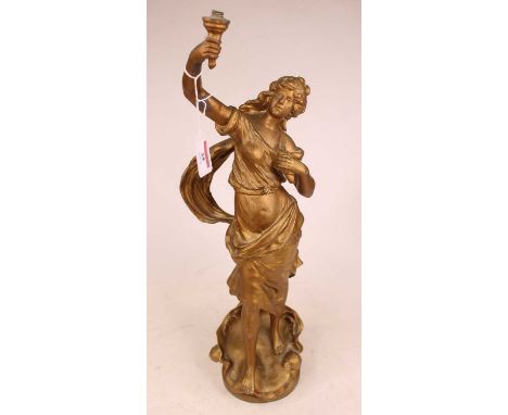 After Auguste Moreau (1834-1912) - a French gilt spelter figural lamp, in the form of a maiden in standing pose with raised r