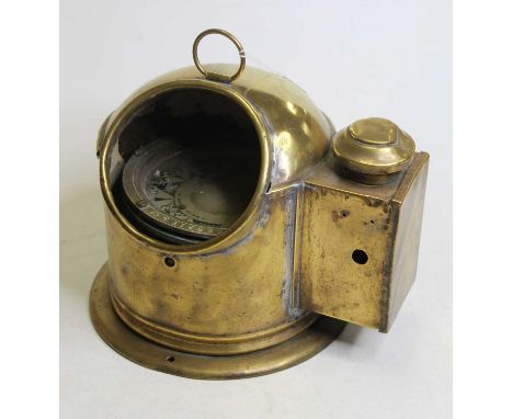 An early 20th century brass cased ships binnacle, the gimbal mounted compass marked to the brass outer rim 'Gebbie &amp; Co',