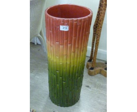 An early 20thC Ault pottery stickstand with bamboo effect decoration  24''h       SR