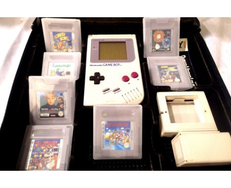 Nintendo Game Boy with eight games, Bubble Ghost, Star Trek, Super Mario Land, Tetris, Dr X Mario, Home Alone 2, Donkey Kong 