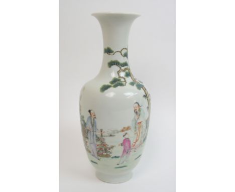 A Chinese baluster vase painted with figures beneath a pine tree and before rockwork issuing bamboo and prunus, Qianlong seal