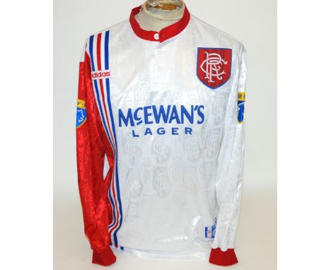 A white Rangers shirt No.6, with button-up collar and embroidered cloth badge inscribed RFC, the sleeves with S.F.L. flashes 