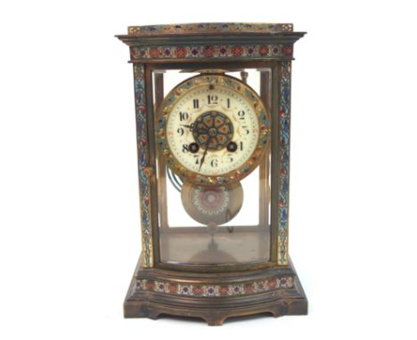 A French champleve enamel four glass mantle clock the dial with painted floral swags, with central enamel roundel and outer r