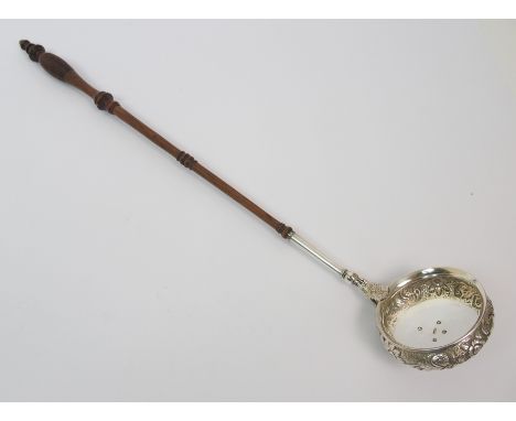 A Scottish silver toddy ladle by Alexander Mitchell, Glasgow 1839, with turned wood handle, 48cm long