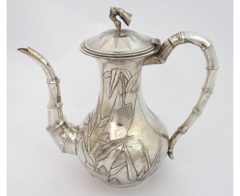 A Chinese silver baluster teapot decorated with bamboo all-over, stamped marks, Woshing, 22cm high, 28oz