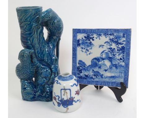 A Chinese oviform vase painted with a basket of flowers, precious objects, fruit and ribbon ties, 9.5cm high, a blue and whit