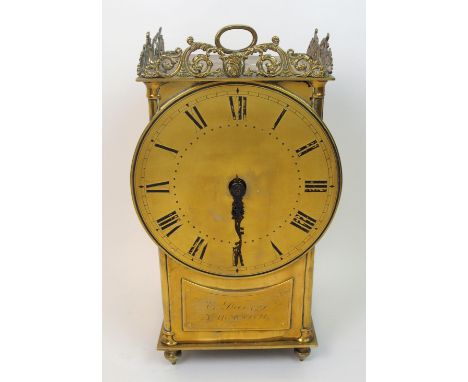 An early 19th century brass bracket clock by Elijah Davey, Yarmouth the square brass case with oversized dial showing Roman n