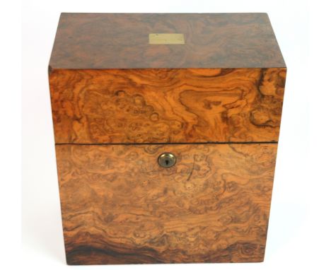 A Victorian walnut decanter box with hinged lid, the blue felt fitted interior with later glass decanters, 28cm and Victorian