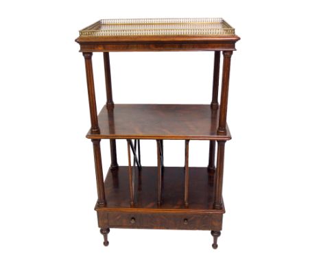 A Victorian rosewood Canterbury whatnot the brass baluster gallery above an open shelf and four divisions below, with a drawe