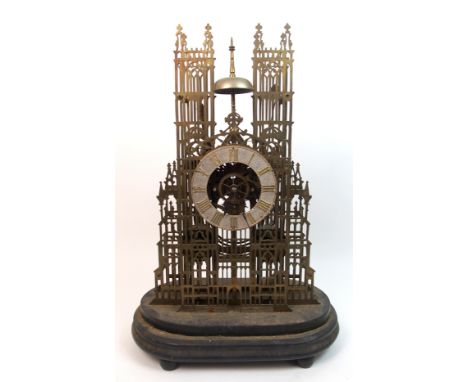 A 19th century brass skeleton clock of York Minister with chain driven movement, with retailer's plaque for A.M***** Blackpoo