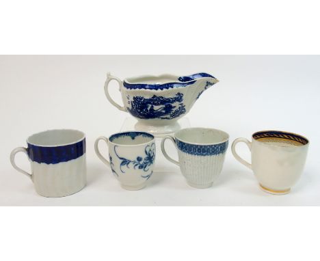 Three 18th century blue and white Caughley pottery cups one with floral decoration, one with moulded decoration and the other