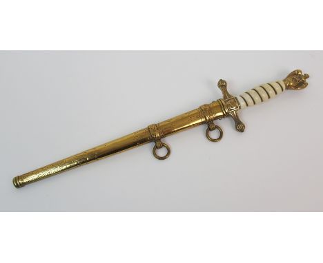 A German Third Reich naval officer's dagger  ivory celluloid wirebound grip, eagle pommel and anchor to the Cross Guard, bras