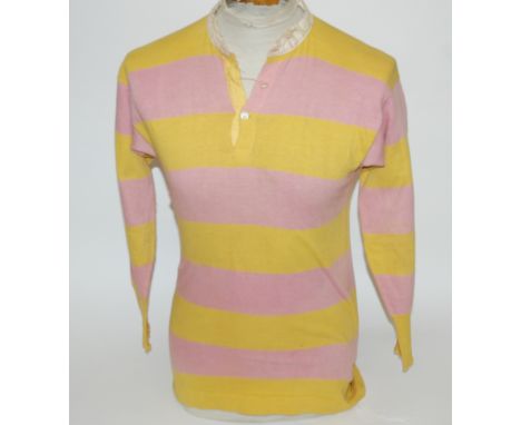 A primrose and pink Scotland shirt with button-up collar, lacking badge, areas of wear, collar frayed Provenance: Christie's 