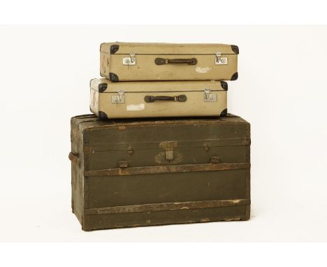 An old Russian trunk, 'J. Muller, St Petersburg', canvas and wood, containing linen, and two suitcases with Cunard labels