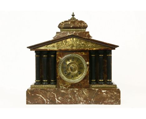 A large marble cased portico clock, the rouged case with brass mounts, and brass dial, the movement stamped Ansonia Clock Co.