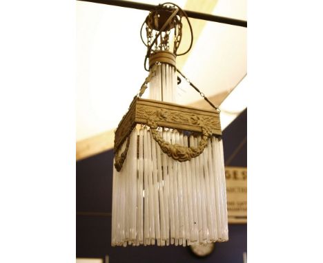 A Continental pressed metal ceiling light, with glass drops, 59cm high