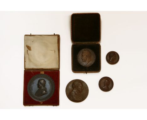 A collection of 19th and 20th century medals, including a Pope Pius IX example, an Alexander I medal by Andrieu, a Charles He