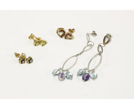 A pair of 9ct white gold drop  earrings, with topaz and amethyst tumble polished beads, a pair of gold ruby heart shaped earr