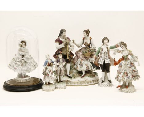 A Continental porcelain figural group of a gentlemen and his companion, together with further porcelain figures, pewter dishe