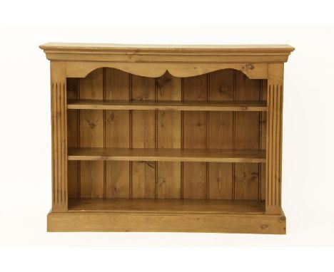 A pine book shelf on plinth base, 122 x 35 x 92cm