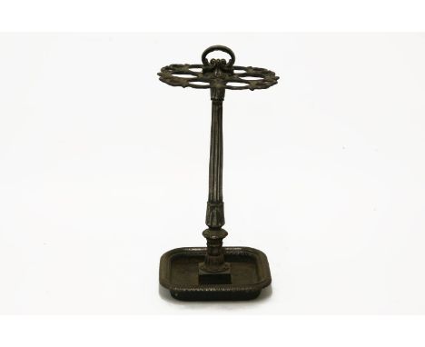 A 19th century cast iron stick stand, the central fluted column over square drip tray, 70cm tall