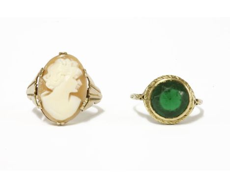 An American gold single stone green paste ring marked 14k, and a 9ct gold shell cameo ring3.42g