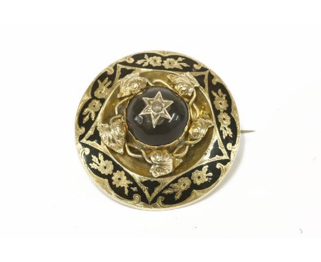 A Victorian gold mourning brooch, single cultured pearl in a star setting on a raised enamel boss, with gold leaf garland to 