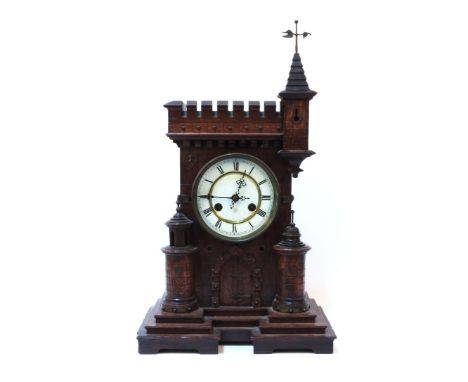 An oak mantel clock in the form of a castle, German, early 20th century, with a Junghans movement, 54cm high