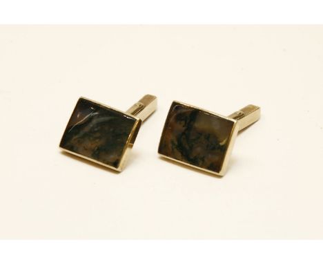 A pair of 9ct gold rub set rectangular moss agate swivel cufflinks