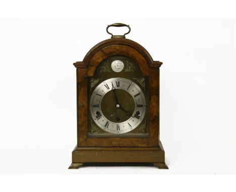 An Elliott London, for Alexander Clark Co Ltd, walnut cased table clock, the eight day lever movement striking Westminster an