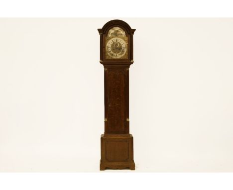 An oak longcase clock, with an encased brass dial, with a silvered chapter ring, with a eight day movement, inscribed EDWARD 
