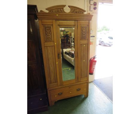 LIGHT OAK SINGLE DOOR WARDROBE WITH MIRROR PANEL, SINGLE DRAW TO BASE AND CARVED DETAILED