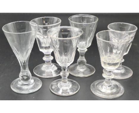 Six 19th century wine glasses - (1) pillar cut bucket bowl of eight facets with single blade knop to the stem, 9.7cm; (2) a s