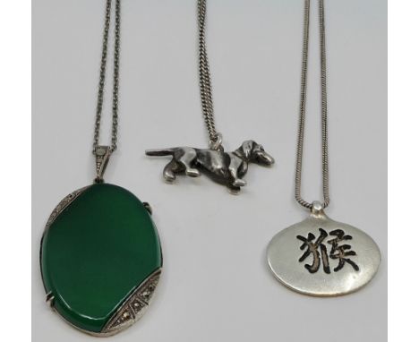 Three pendants on chains -  Wachenheimer oval pendant set with green jade type stone and marcasites on microchain; an 835 whi