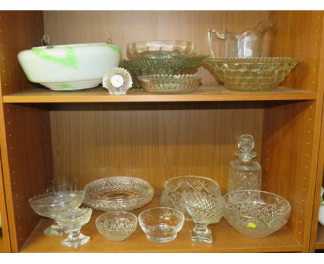 CUT AND MOULDED GLASS INCLUDING BOWLS, DECANTER AND JUG, WATERFORD CRYSTAL MANTEL CLOCK, AND AN OPAQUE GLASS LAMP SHADE