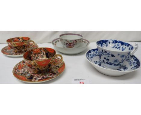 A pair of Davenport tea cups and saucers in Imari palette, pattern number 3545; a 19th century porcelain tea bowl and saucer 