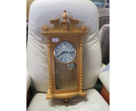 EMPEROR QUARTZ CHIMING WALL CLOCK IN LIGHT WOOD CASE