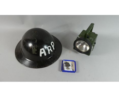 A Collection of WWII ARP Ephemera to Include Helmet, Badge, Button, Torch etc 
