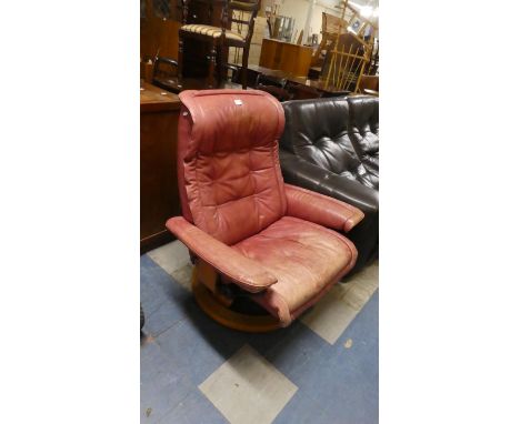A Vintage Swivel Leather Upholstered Armchair 