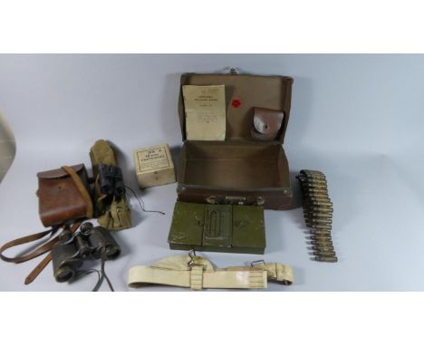 A Vintage Leather Case Containing Binoculars, 12 Bore Military Cartridge Box, Machine Gun Bullet Belt Etc 